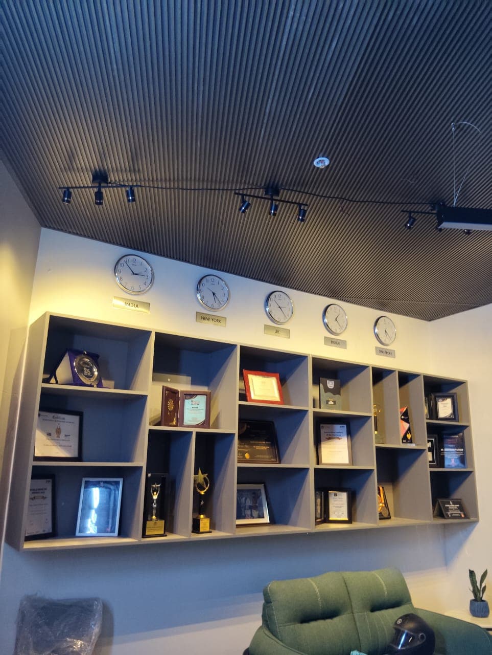 World Development Corporation office: Lounge shelving and lighting