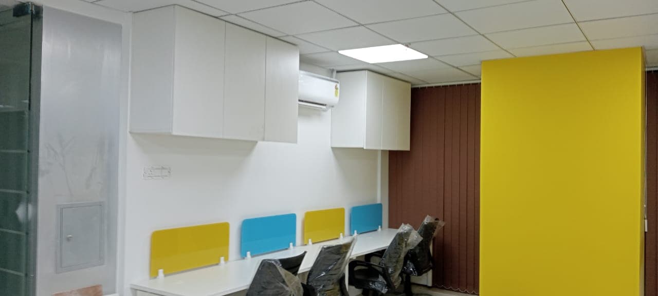 World Development Corporation office: Colourful breakout seating